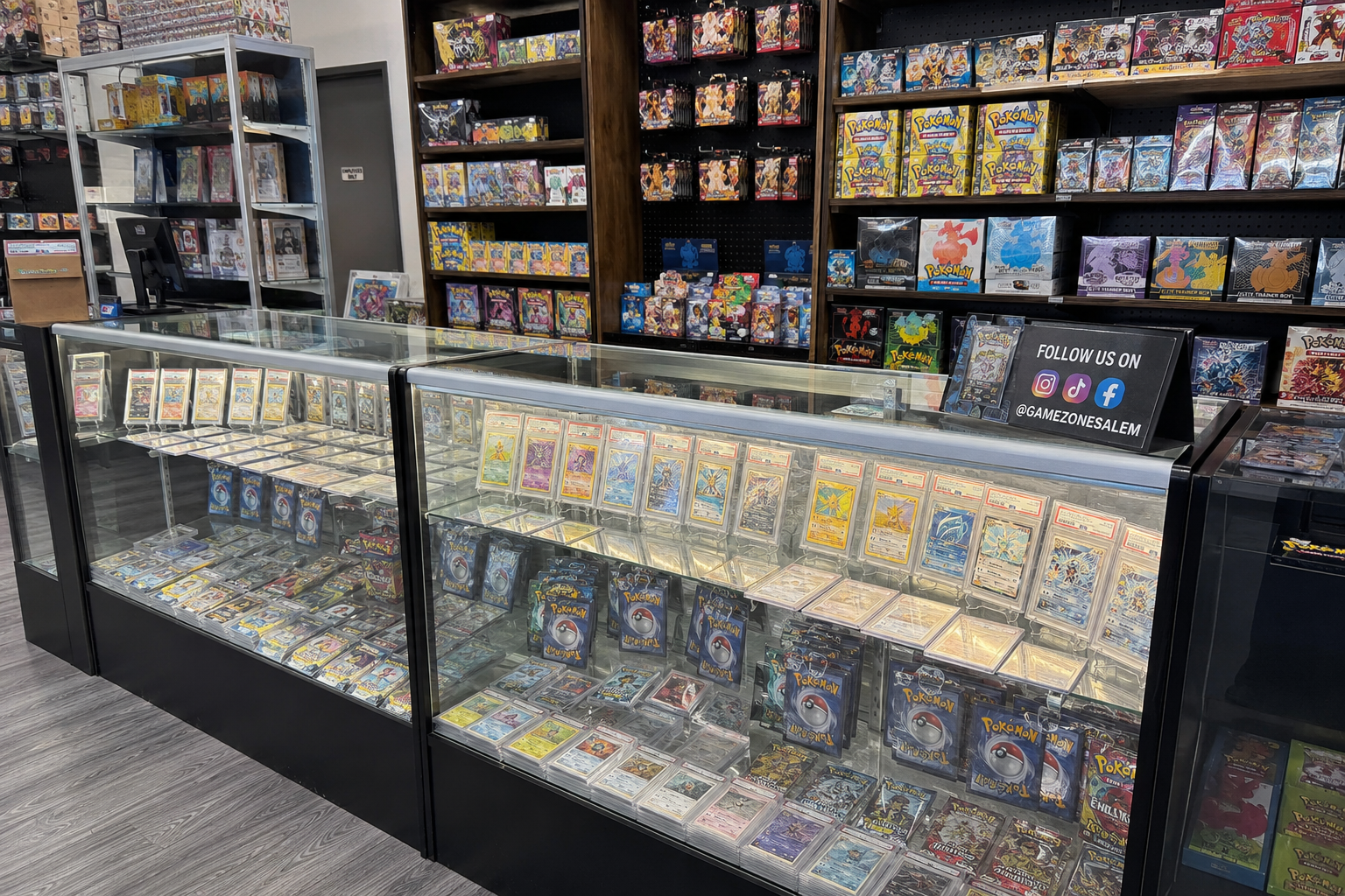 Trading card shop display of graded cards and sealed product — what a card shop website costs in 2026
