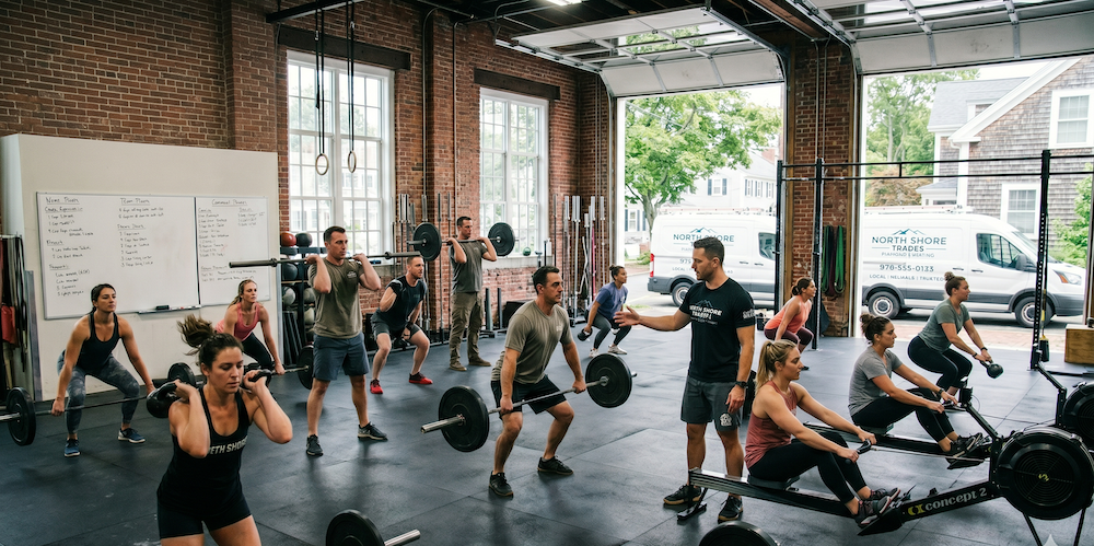 Members training at a North Shore MA CrossFit gym — what a gym website needs to sign members